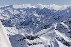 Fresh snow on mountains over the back of Treble Cone ski field, Wanaka, New Zealand.