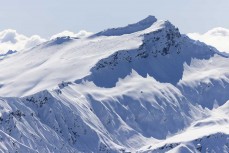 Backcountry adventures during a powder day out the back of Treble Cone ski field, Wanaka, New Zealand.