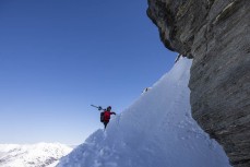 Alicia Zimmel hikes the summit during a powder day at Treble Cone ski field, Wanaka, New Zealand.