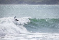 Billy Stairmand hits a section during a spring swell at Manu Bay, Raglan, Waikato, New Zealand.