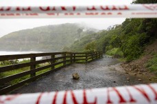 Rain streams in waterfalls off cliffs at Second Beach during a red heavy rain warning that caused a state of emergency to be declared due to widespread flooding from October 3- October 4, 2024 in Dunedin, New Zealand.
Photo: Derek Morrison