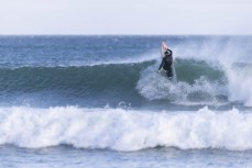 Will Hardie makes the most of a clean small swell at St Kilda, Dunedin, New Zealand.Photo: Derek Morrison