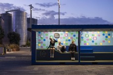 Friends hang out at dusk in the Wharau kōrero near the silo city in downtown Auckland, New Zealand.Photo: Derek Morrison