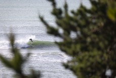 Alexis Owen during a swell on the north coast of Dunedin, New Zealand.