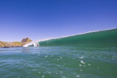 Alexis Owen gets barrelled during a small punchy swell at Blackhead, Dunedin, New Zealand.Photo: Derek Morrison