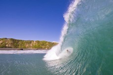 Alexis Owen gets barrelled during a small punchy swell at Blackhead, Dunedin, New Zealand.Photo: Derek Morrison