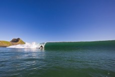 Flint Sherborne-France bottom turns during a small punchy swell at Blackhead, Dunedin, New Zealand.Photo: Derek Morrison