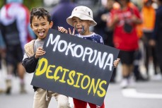 Mikaere Ngatai (left) and Luscian Peni, of Ngati Makino, join the march on the streets of Wellington during the hīkoi mō te tiriti, Wellington, New Zealand. November 19, 2024.Photo: Derek Morrison
