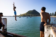 A young lad does a manu at Salisbury Wharf, Mount Maunganui, New Zealand. Photo: Derek Morrison