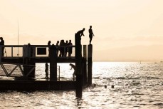 Swimmers practise their manus at Salisbury Wharf, Pilot Bay, Mount Maunganui, New Zealand. Photo: Derek Morrison