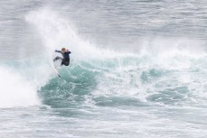 Alexis Owen rides the lip line during a fun summer swell at St Kilda, Dunedin, New Zealand.
Photo: Derek Morrison
