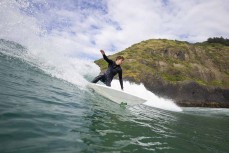 Flint Sherborne-France carves back to the source during a fun summer swell at Seconds near St Clair, Dunedin, New Zealand.
Photo: Derek Morrison
