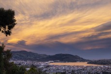 Sunset and wild clouds over the City of Dunedin, New Zealand.Photo: Derek Morrison
