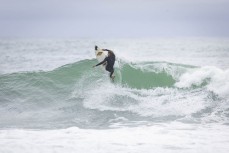Lewis Murphy on form during a swell on the north coast of Dunedin, New Zealand.