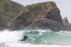 Alexis Owen at a remote beach break in the Catlins, New Zealand. Photo: Derek Morrison
