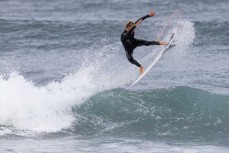 Benji Lowen during a small swell on the Surf Coast Highway SH45, near New Plymouth, Taranaki, New Zealand.