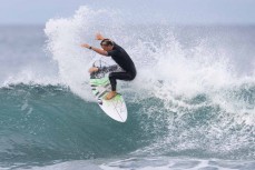 Frank Roberts during a small swell on the Surf Coast Highway SH45, near New Plymouth, Taranaki, New Zealand.