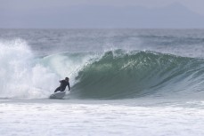 Jake Scott on form during a swell on the north coast of Dunedin, New Zealand.