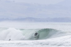 Nixon Reardon in his happy place during a swell on the north coast of Dunedin, New Zealand.