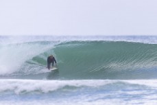 Lewis Murphy during a swell on the north coast of Dunedin, New Zealand.