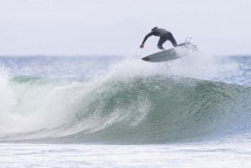 during a swell on the north coast of Dunedin, New Zealand.