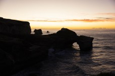 Sunrise on the Otago coastline with Sam Charlesworth of The Beatniks, Dunedin, New Zealand. Photo: Derek Morrison