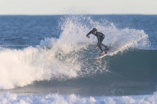 A surfer makes the most of a fun swell at St Kilda, Dunedin, New Zealand.Photo: Derek Morrison