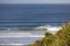 Empty wave at a remote reef break in the Catlins, New Zealand. Photo: Derek Morrison