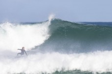 Reuben Morrison at a remote reef break in the Catlins, New Zealand. Photo: Derek Morrison