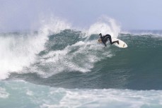 Lewis Murphy at a remote reef break in the Catlins, New Zealand. Photo: Derek Morrison