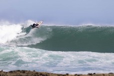 Theo Morse at a remote reef break in the Catlins, New Zealand. Photo: Derek Morrison