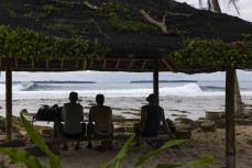 The lineup during a September swell at Thunders in the Mentawais Island chain, Western Sumatra, Indonesia.