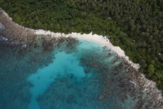 Azure blue water near Thunders in the Mentawais Island chain, Western Sumatra, Indonesia.