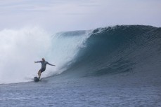 Paul Bags during a September swell in the Mentawais Island chain, Western Sumatra, Indonesia.