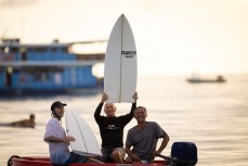 Phil Isaac and Phil McVeigh with broken boards and Uncu in the Mentawai Islands, Sumatra, Indonesia.