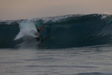 Keo Morrison gets barreled at the Mentawai Islands, Sumatra, Indonesia.