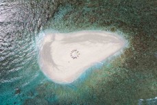 The 2025 Mahogany crew on a sand island in the Mentawai Islands, Sumatra, Indonesia.