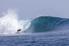 Keo Morrison rides a wave in the Mentawai Islands, Sumatra, Indonesia.