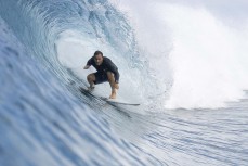 Brett Wood gets barelled at a remote wave in the Mentawai Islands, Sumatra, Indonesia.