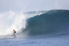 Frank Roberts on a set wave in a remote location in the Mentawai Islands, Sumatra, Indonesia.