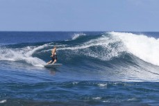 Keo Morrison at a reefbreak in the Mentawai Islands, Sumatra, Indonesia.