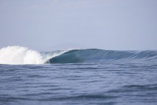 Empty lineup at a remote break in the Mentawai Islands, Sumatra, Indonesia.