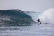 Phil McVeigh finds a set wave at a remote break in the Mentawai Islands, Sumatra, Indonesia.