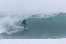 Keo Morrison picks the eyes out of a winter session at Blackhead, Dunedin, New Zealand.