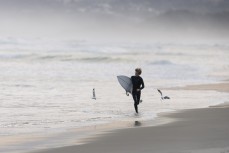 Keo Morrison picks the eyes out of a winter session at Blackhead, Dunedin, New Zealand.
