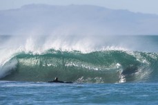 Keo Morrison chasing barrels during a punchy swell on the South Coast near Dunedin, New Zealand.