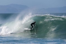 Keo Morrison chasing barrels during a punchy swell on the South Coast near Dunedin, New Zealand.