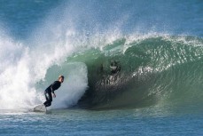 Keo Morrison chasing barrels during a punchy swell on the South Coast near Dunedin, New Zealand.