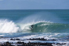 Keo Morrison chasing barrels during a punchy swell on the South Coast near Dunedin, New Zealand.