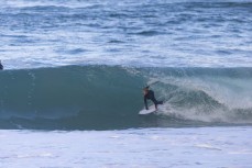 Keo Morrison during a southerly swell at a beach break on the Otago Peninsula, Dunedin, New Zealand.